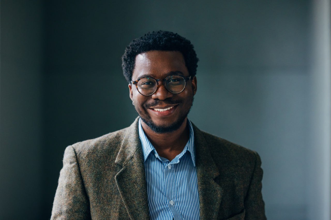 smiling-man-glasses-business-attire