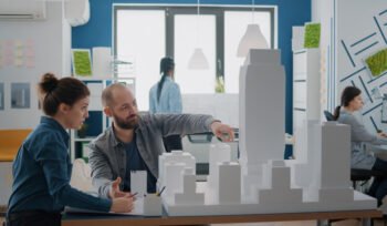 architecture-design-team-working-on-city-model