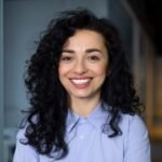 smiling-woman-blue-shirt