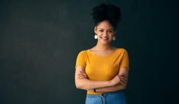 smiling-woman-yellow-shirt